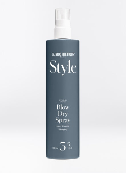 Blow Dry Spray is the perfect strengthening base layer for a smooth blowout or before putting the hair in curlers. It offers medium hold, added shine, and anti-static properties- all while looking (and feeling) extra soft. Shop online or in store at Shampoo Har Bar in Victoria, BC. 