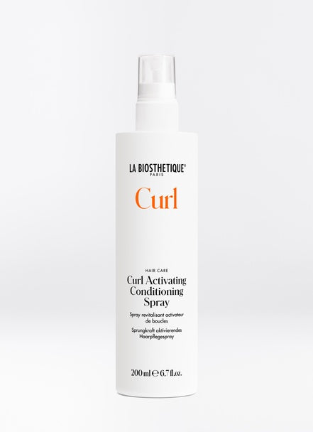 Curl Activating Conditioning Spray binds moisture inside the hair structure to keep frizz at bay and provide shine. This spray is perfect for finger styling, air-drying, diffusing and re-styling. Shop online or in store at Shampoo Hair Bar in Victoria, BC.