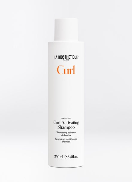 Curl Activating Shampoo provides extra gentle cleansing to all curl types. Natural moisturizers stop dehydration and add silky shine. Shop online or in store at Shampoo Hair Bar in Victoria, BC.